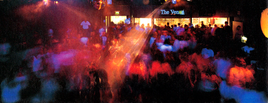 Dance floor of Union with disco lights and smoke