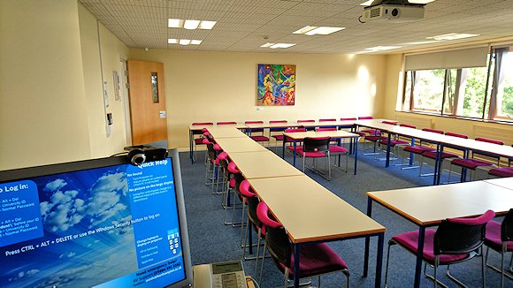Typical lecture / seminar room in Cottesbrooke - with chairs, tables and a PC