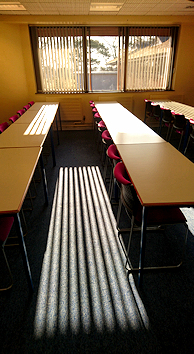 Sun streams into a lecture room
