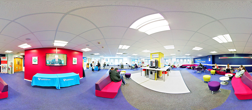 Students in a large open plan room